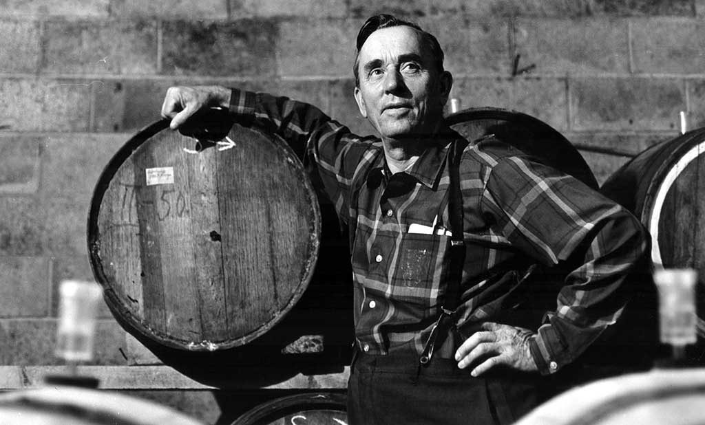 Dr Frank standing with barrel