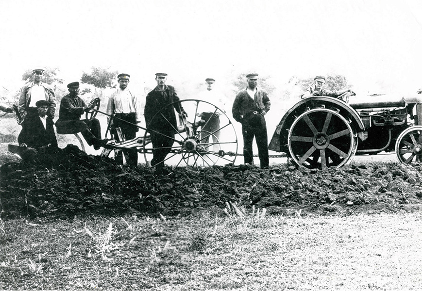 Konstantin with friends with tractors.