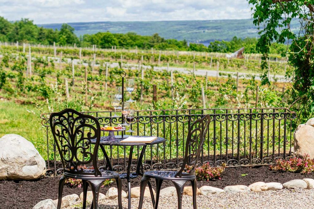 Table and 2 chairs outside tasting