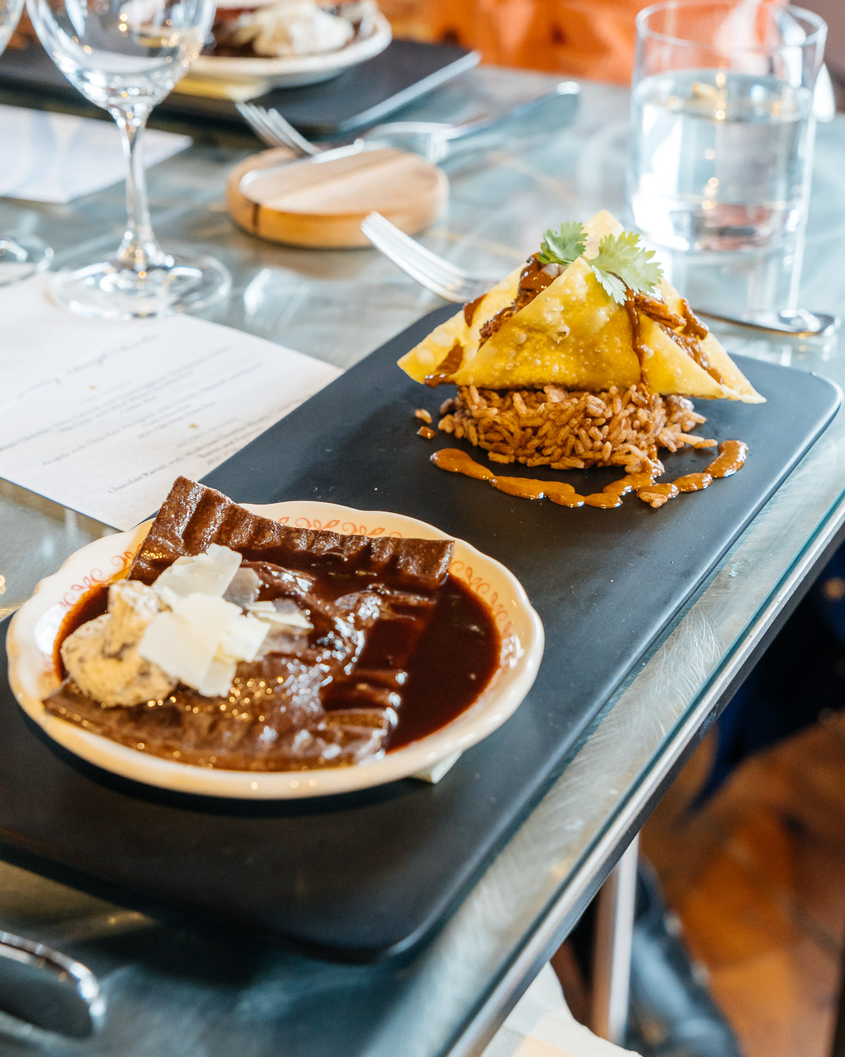 Plate of Chocolate Ravioli and Mole Chicken Taco