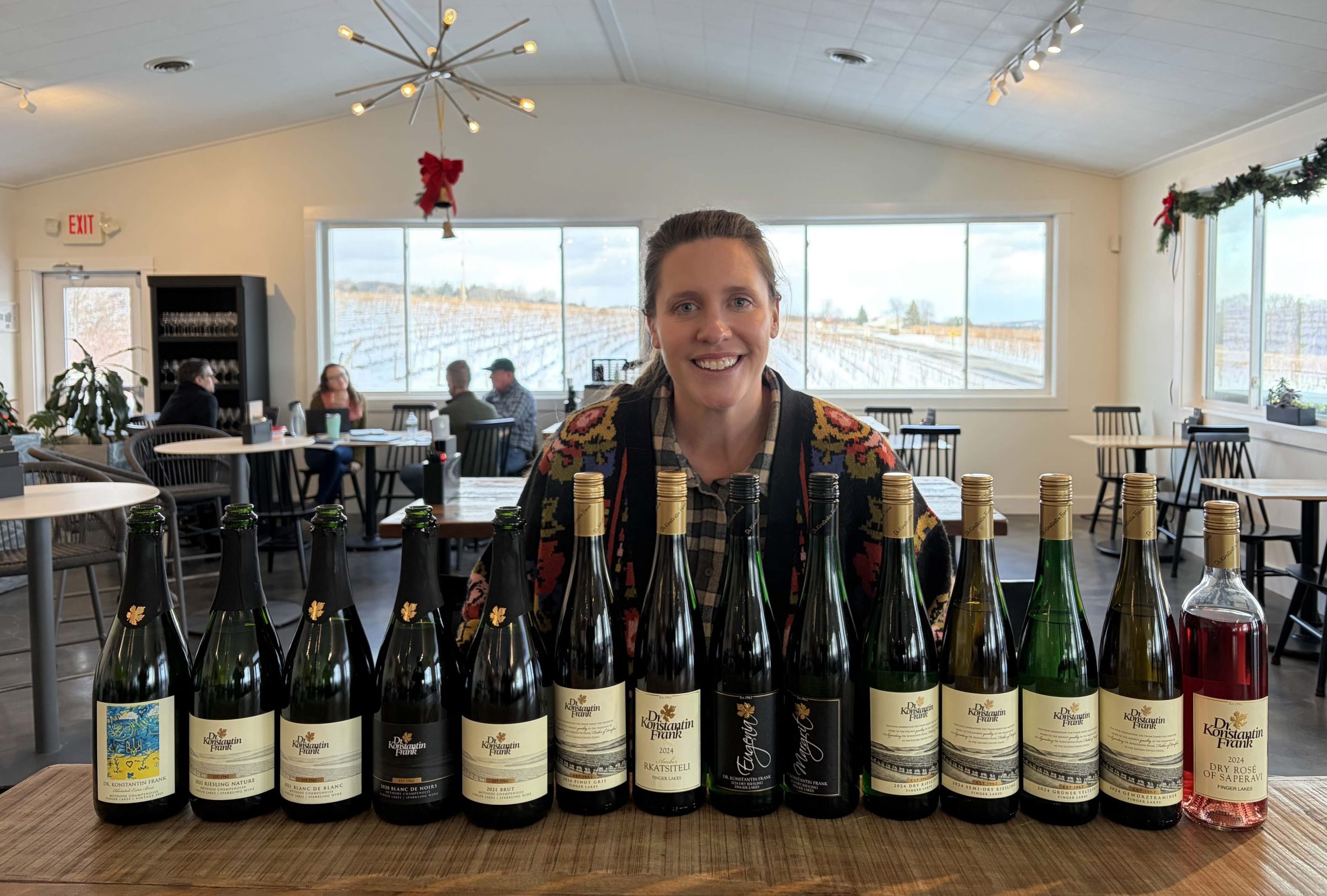 Meaghan Frank with Wines. Photo Credit Brian Freedman, James Suckling