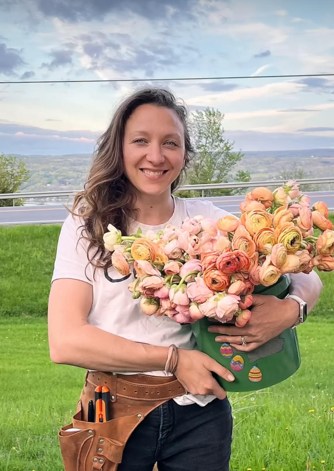 Holly from Nouveau Flower Farm holding flowers
